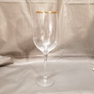Tall wine glass with gold rim